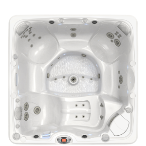 Aerial view of a white jacuzzi with multiple jets and contoured seats, designed for relaxation and hydrotherapy.
