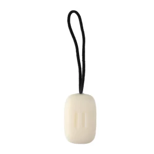 White bar of soap with a black rope looped through, designed for convenient hanging and drying in a bathroom setting.